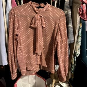 Work Appropriate poly top with attached tie.